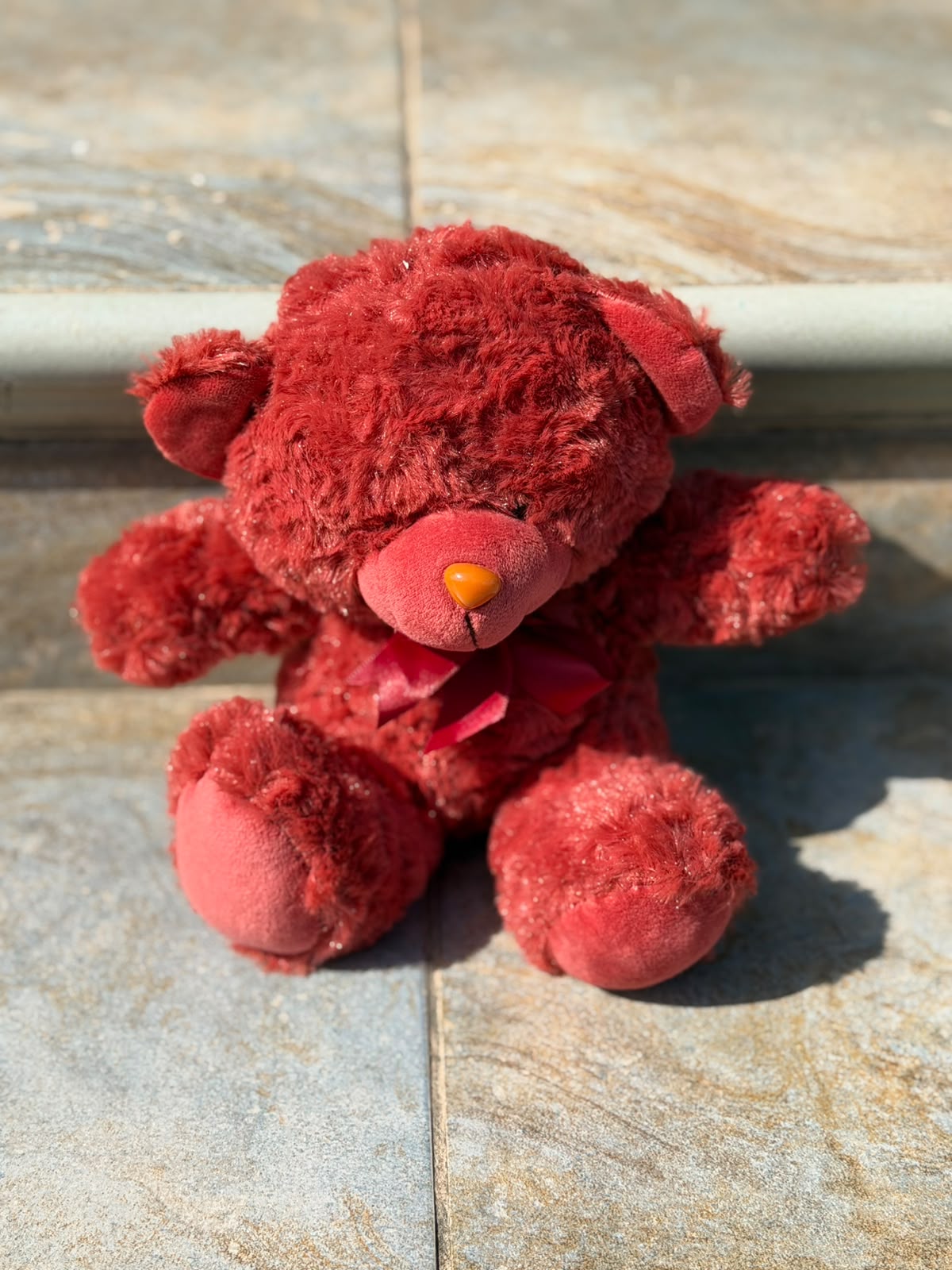 Burgundy teddy bear